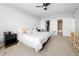 Comfortable bedroom with a large bed, a walk-in closet, and a modern dresser at 2479 Peachtree Ne Rd # 1801, Atlanta, GA 30305