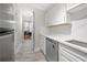 Modern kitchen featuring stainless steel appliances, white cabinets, and marble countertops at 2479 Peachtree Ne Rd # 1801, Atlanta, GA 30305