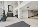 Bright lobby area featuring high ceilings, modern decor, and tiled floors at 2479 Peachtree Ne Rd # 1801, Atlanta, GA 30305