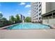 Enjoy this building's refreshing outdoor pool with brick trim, perfect for relaxation and recreation at 2479 Peachtree Ne Rd # 1801, Atlanta, GA 30305