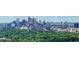 Stunning skyline view overlooking a lush green canopy of trees with the city in the distance at 2479 Peachtree Ne Rd # 1801, Atlanta, GA 30305