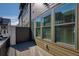 Private balcony with wood flooring and views of the surrounding community at 6790 Encore Blvd, Sandy Springs, GA 30328
