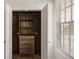 Bedroom closet featuring custom shelving and drawers for ample storage at 6790 Encore Blvd, Sandy Springs, GA 30328