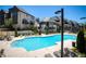Resort-style community pool with lounge chairs and nearby upscale residences at 6790 Encore Blvd, Sandy Springs, GA 30328