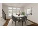 Inviting dining area with modern decor, including a stylish round table, comfortable seating, and ample natural light at 6790 Encore Blvd, Sandy Springs, GA 30328