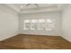 Spacious bedroom with tray ceiling, ceiling fan, and large window at 6790 Encore Blvd, Sandy Springs, GA 30328
