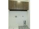 Mudroom features lots of closed storage space with cabinets and eye-catching pattern tile floor at 6790 Encore Blvd, Sandy Springs, GA 30328