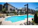 Large community pool with lounge chairs and manicured landscaping in Aria community at 6790 Encore Blvd, Sandy Springs, GA 30328