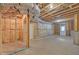 Unfinished basement showing insulation, electrical and plumbing at 859 Heritage Lake Way, Grayson, GA 30017