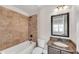 Modern bathroom features tile shower, granite countertop and elegant fixtures at 859 Heritage Lake Way, Grayson, GA 30017