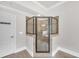 Stylish bathroom boasting a glass-enclosed shower, neutral tiling, and modern fixtures at 859 Heritage Lake Way, Grayson, GA 30017