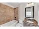 Stylish bathroom featuring granite countertop, tiled shower, and modern fixtures at 859 Heritage Lake Way, Grayson, GA 30017