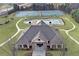 Aerial of community clubhouse, pool and tennis courts at 859 Heritage Lake Way, Grayson, GA 30017