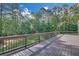 Spacious backyard deck is perfect for entertaining and enjoying the surrounding green landscape at 859 Heritage Lake Way, Grayson, GA 30017