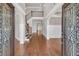 Grand foyer with gleaming hardwood floors, soaring ceilings, and staircase at 859 Heritage Lake Way, Grayson, GA 30017