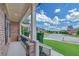 Covered front porch featuring brick pillars, and professional landscaping, perfect for relaxing at 859 Heritage Lake Way, Grayson, GA 30017
