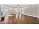Spacious main bedroom with tray ceilings, fireplace, and large windows at 859 Heritage Lake Way, Grayson, GA 30017