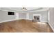 Expansive main bedroom with fireplace, TV, and modern ceiling fan at 859 Heritage Lake Way, Grayson, GA 30017