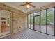 Sunroom features brick walls, and screened-in patio at 859 Heritage Lake Way, Grayson, GA 30017