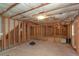 Unfinished basement displaying exposed framing and utilities, ready for customization at 11354 Conner Ct, Hampton, GA 30228