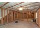 Unfinished basement framed and ready for customization, providing ample space and potential at 11354 Conner Ct, Hampton, GA 30228