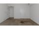 Unfurnished bedroom featuring carpeted floors, white walls, and a double-door closet at 11354 Conner Ct, Hampton, GA 30228