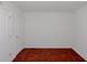 Small empty bedroom with tile floors and white paint at 11354 Conner Ct, Hampton, GA 30228