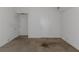 Unfurnished bedroom with neutral carpet, a high ceiling, and two entry doors at 11354 Conner Ct, Hampton, GA 30228