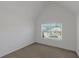 Cozy bedroom featuring a large window offering natural light at 11354 Conner Ct, Hampton, GA 30228