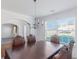 Elegant dining room with a chandelier, large window, and space for entertaining at 11354 Conner Ct, Hampton, GA 30228