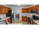 Traditional kitchen featuring stainless steel appliances and light countertops with tile flooring at 11354 Conner Ct, Hampton, GA 30228