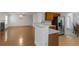 Open floor plan connecting the kitchen and living room for easy entertaining and Gathering gatherings at 11354 Conner Ct, Hampton, GA 30228