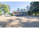 Spacious backyard, with a shed, home, and carport at 1508 Franklin Cir, Dacula, GA 30019
