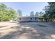 Backyard with a shed, home, and carport at 1508 Franklin Cir, Dacula, GA 30019