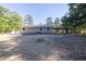 Backyard with a shed, home, and carport at 1508 Franklin Cir, Dacula, GA 30019