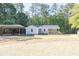 Inviting single-story home featuring a lovely front porch and well-maintained lawn at 1508 Franklin Cir, Dacula, GA 30019