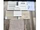 Display of samples of flooring, cabinets, fixtures and other materials selected for new construction at 3106 Marbella Cir # 3, Kennesaw, GA 30152