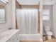 Bathroom featuring vanity, mirror, tile flooring, toilet, and shower at 392 Vine St, Atlanta, GA 30314