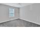 Bedroom featuring carpet, natural light from one window, and a ceiling fan at 392 Vine St, Atlanta, GA 30314