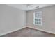 Bedroom featuring carpet, natural light from one window, and a ceiling fan at 392 Vine St, Atlanta, GA 30314