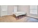 Bedroom featuring carpet, natural light from two windows, and a door to the outside at 392 Vine St, Atlanta, GA 30314