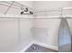 Closet featuring wire shelving, walls, and an ironing board at 392 Vine St, Atlanta, GA 30314