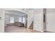 Open-concept area with living room, kitchen and staircase, with hardwood floors at 392 Vine St, Atlanta, GA 30314