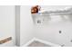 A simple laundry room with washer/dryer hookups and minimal shelving at 392 Vine St, Atlanta, GA 30314