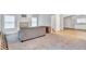 Large living room featuring carpet, fireplace, and entry to a kitchen at 392 Vine St, Atlanta, GA 30314