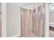 Shower featuring tile walls and shower door at 392 Vine St, Atlanta, GA 30314