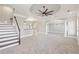 Spacious basement rec room with decorative columns and an open bar at 5034 Hickory Hills Dr, Woodstock, GA 30188