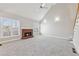 Spacious living room with large windows and brick fireplace at 5034 Hickory Hills Dr, Woodstock, GA 30188