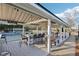 Community pavilion features outdoor seating and bar area, perfect for social gatherings at 5034 Hickory Hills Dr, Woodstock, GA 30188