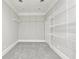 Large walk-in closet features adjustable shelving to suit all your storage needs at 5034 Hickory Hills Dr, Woodstock, GA 30188